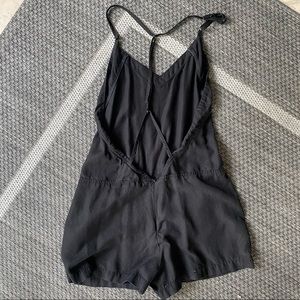 Adorable black open back romper